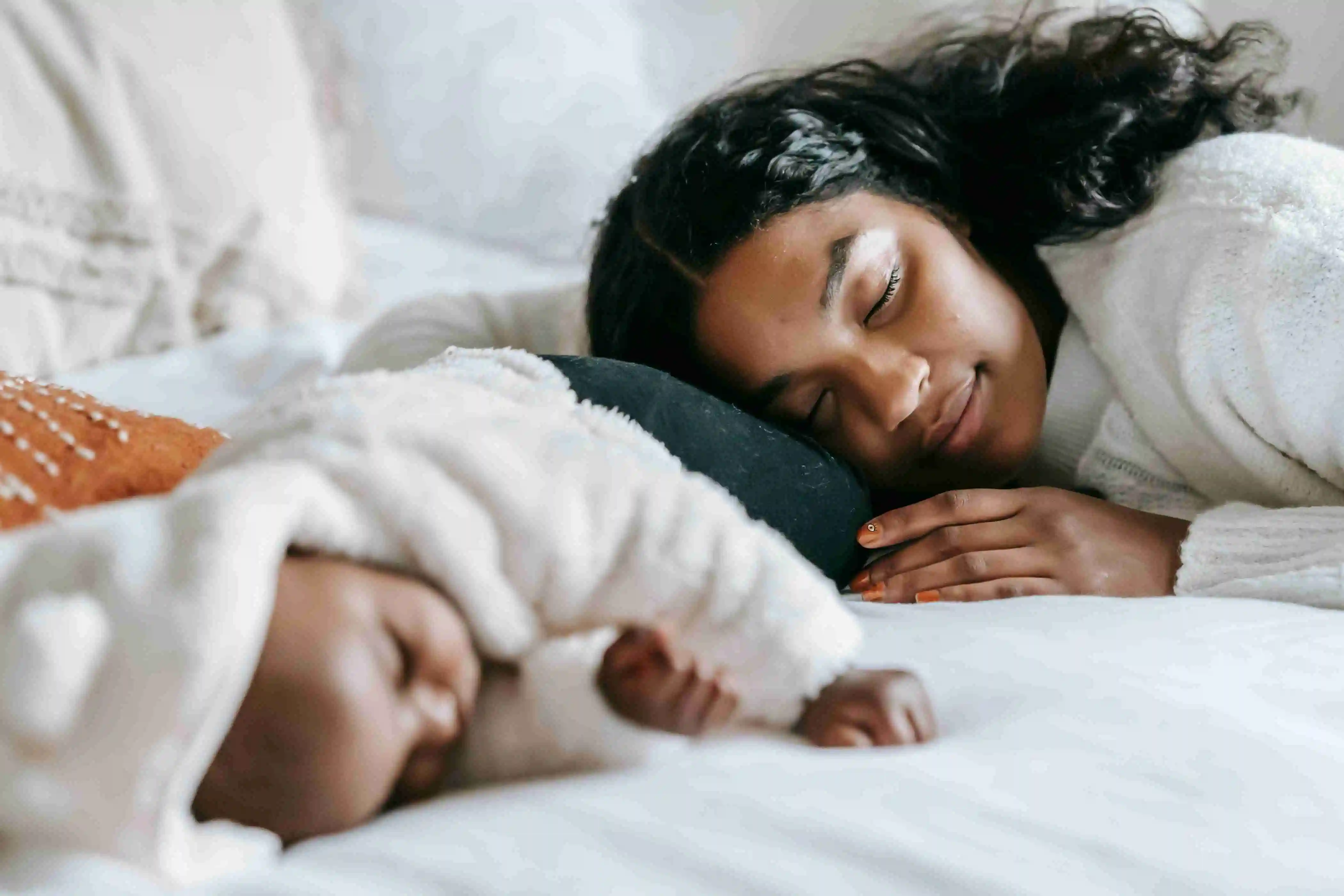 New mother resting after delivery for postnatal recovery