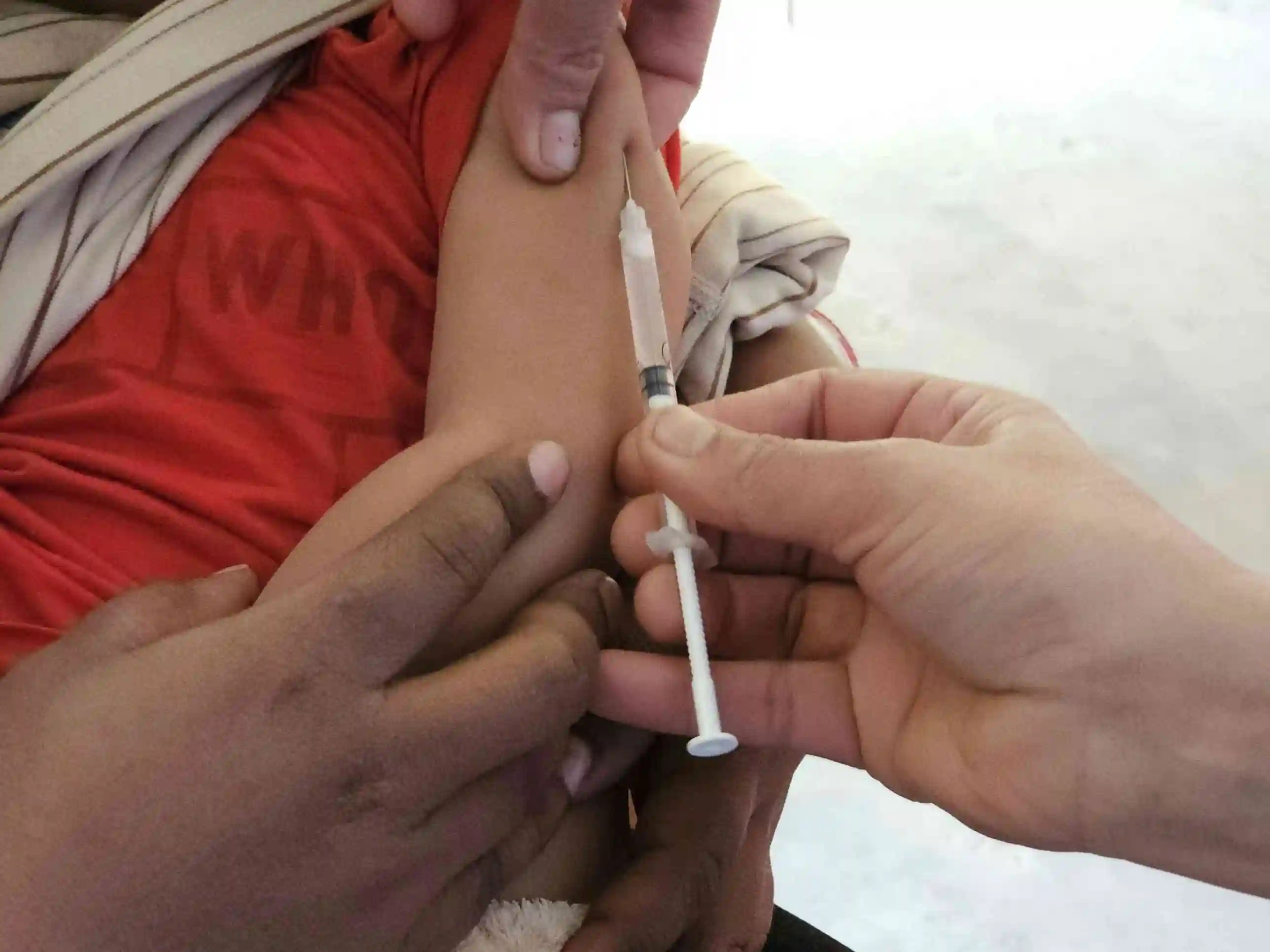 Baby receiving vaccination at Gani Hospital Ramanathapuram paediatric clinic